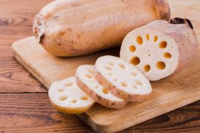 Lotus root chopped on a cutting board.